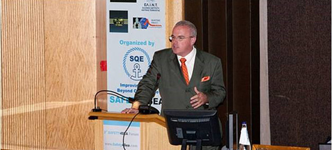 Kevin on stage speaking